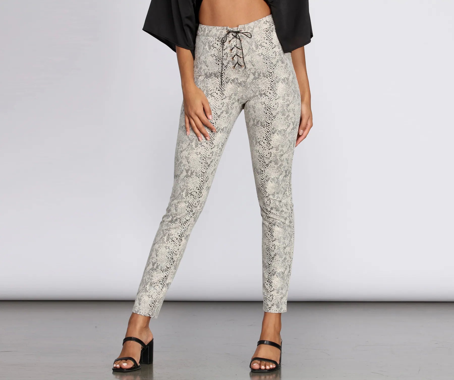 Overstock Sale Sassy Snake Skinny Pants
